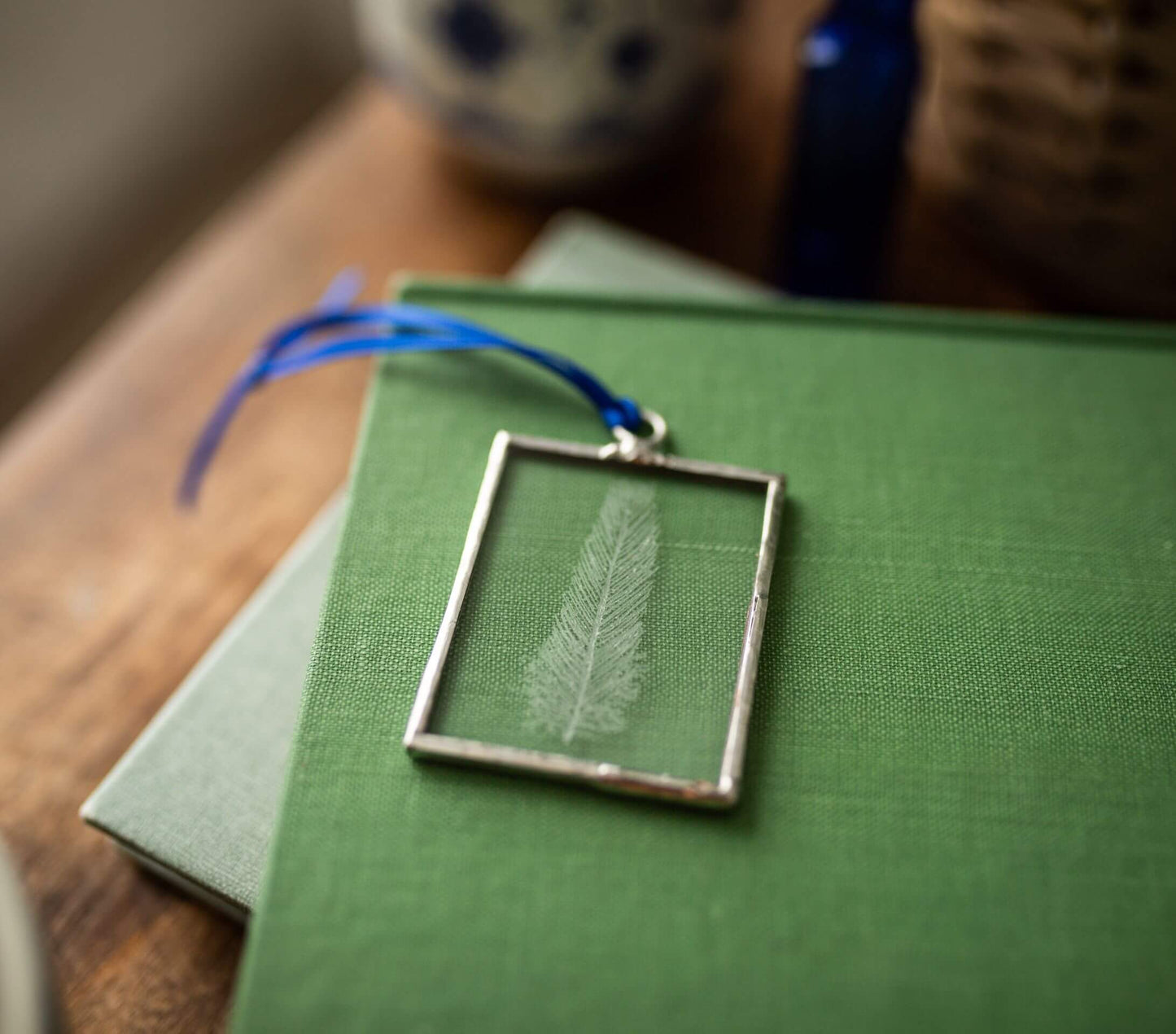 The Corbeau Press Feather Hanging