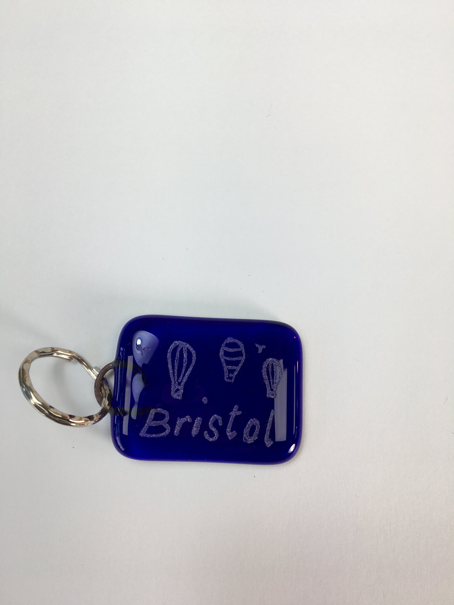 Bristol Blue Glass keyrings each individually engraved. Handmade at Glass Designs a Bristol gift shop.