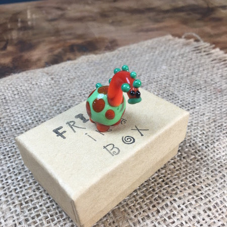 Sue Webb Friends in a box glass Dinosaur. Edit alt text