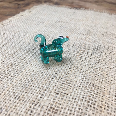 Sue Webb Friends in a box glass dog. Edit alt text