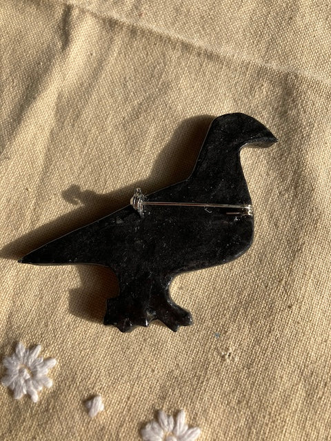 A Blue Pigeon with the text Homeward bound I wish I was on its body. Made from layered paper and steel then sealed with resin. A beautiful Brooch for all pigeon lovers.