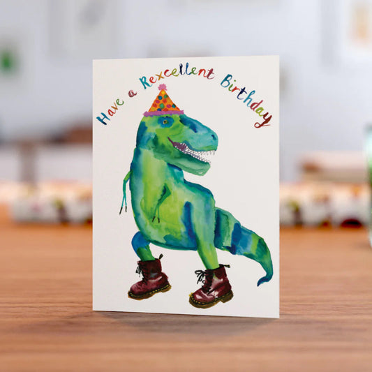 Birthday card with colouful green painting of Tyrannosaurus Rex in party hat and boots
