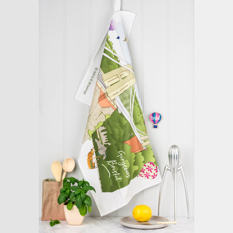 Tea Towel with illustration of Bristol Suspension Bridge, balloons and the Matthew.