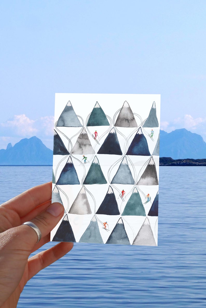 watercolour greetings card with mountains and skiers