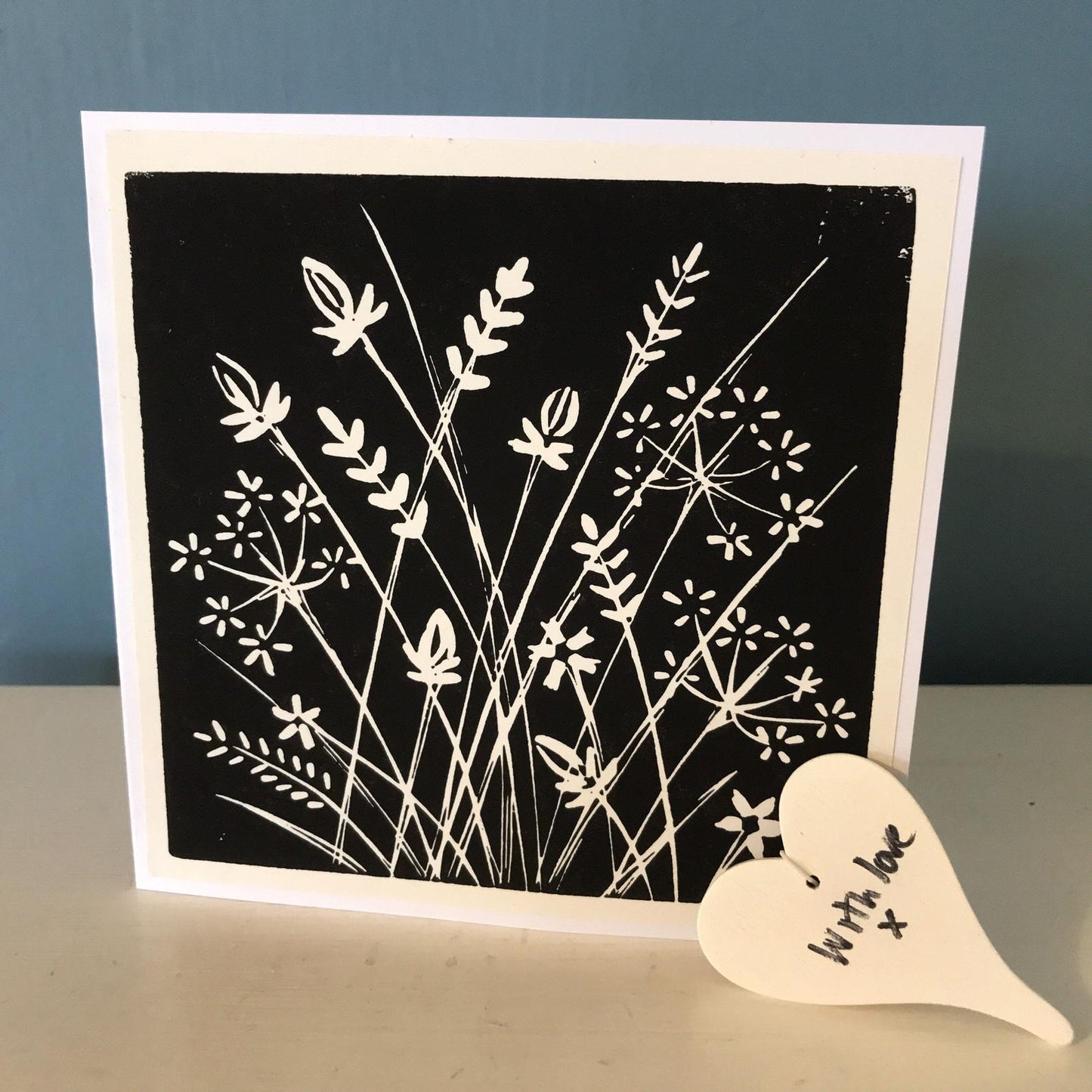 A beautiful single colour hand printed lino print of meadow flowers in Turquoise, or Black or yellow. Handmade in Bristol.