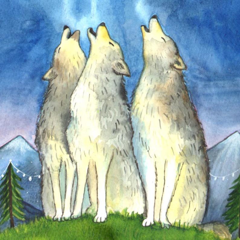 Birthday card with colour illustration of wolves on a hill with mountains behind