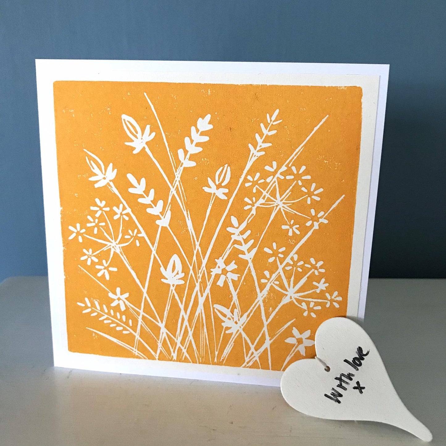 A beautiful single colour hand printed lino print of meadow flowers in Turquoise, or Black or yellow. Handmade in Bristol.