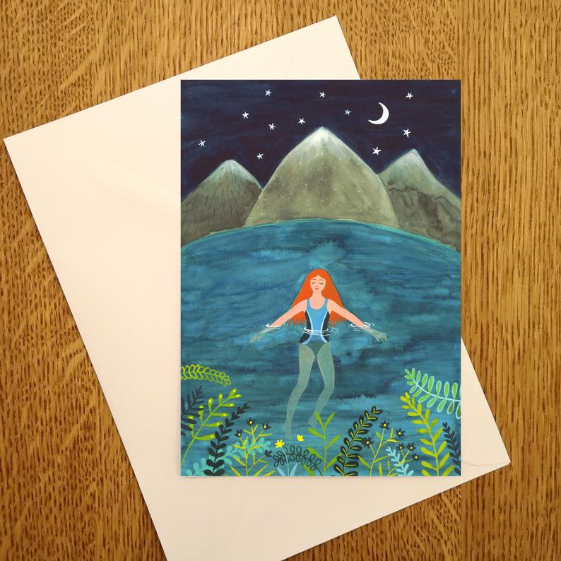 Laura Robertson Night Swimming card. A woman swimming at night in a lake. Edit alt text