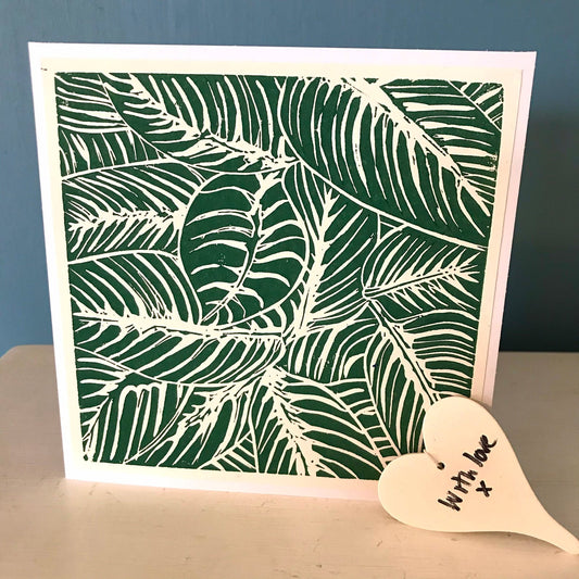Botanical 1.  Handcut lino, individually printed lino cut.  Design of leaves in Dark Green on a cream background. Card is blank in side.  Perfect for any occasion.