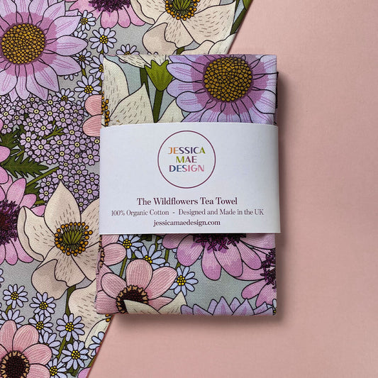 Digital illustration of pinks and lilac wildflowers 100 percent cotton