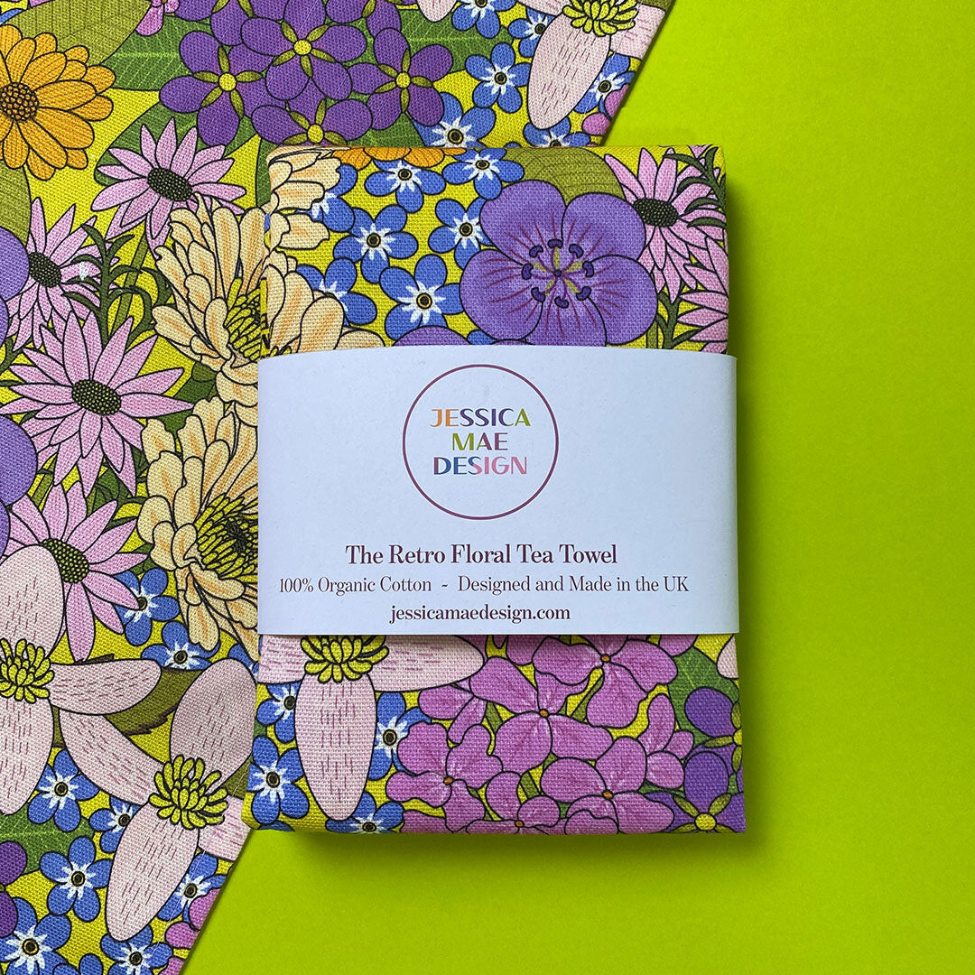 Colourful retro floral t towel. 100 percent cotton.