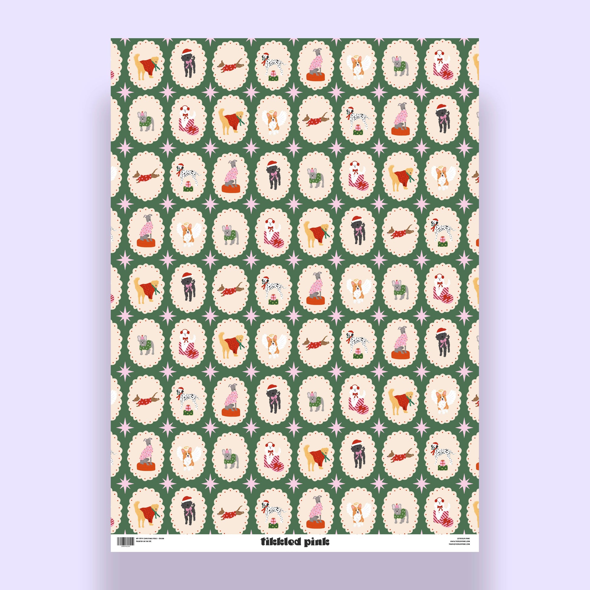 Patterned paper with illustrations of dogs in various poses on a green background