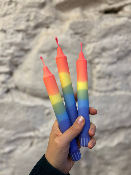 Rainbow dinner candles.