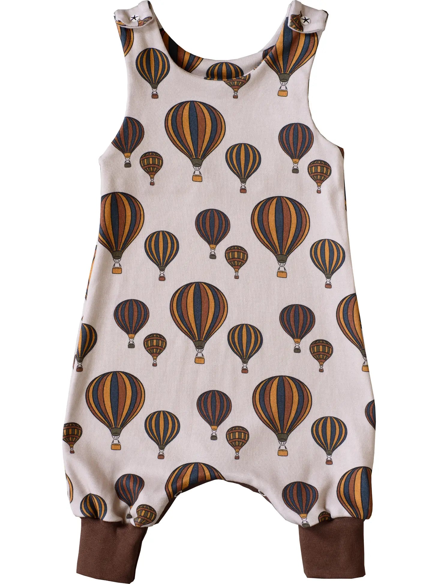 Grow with me romper for babies with hot air balloons fabric in sand colours, sizes from new born upwards.