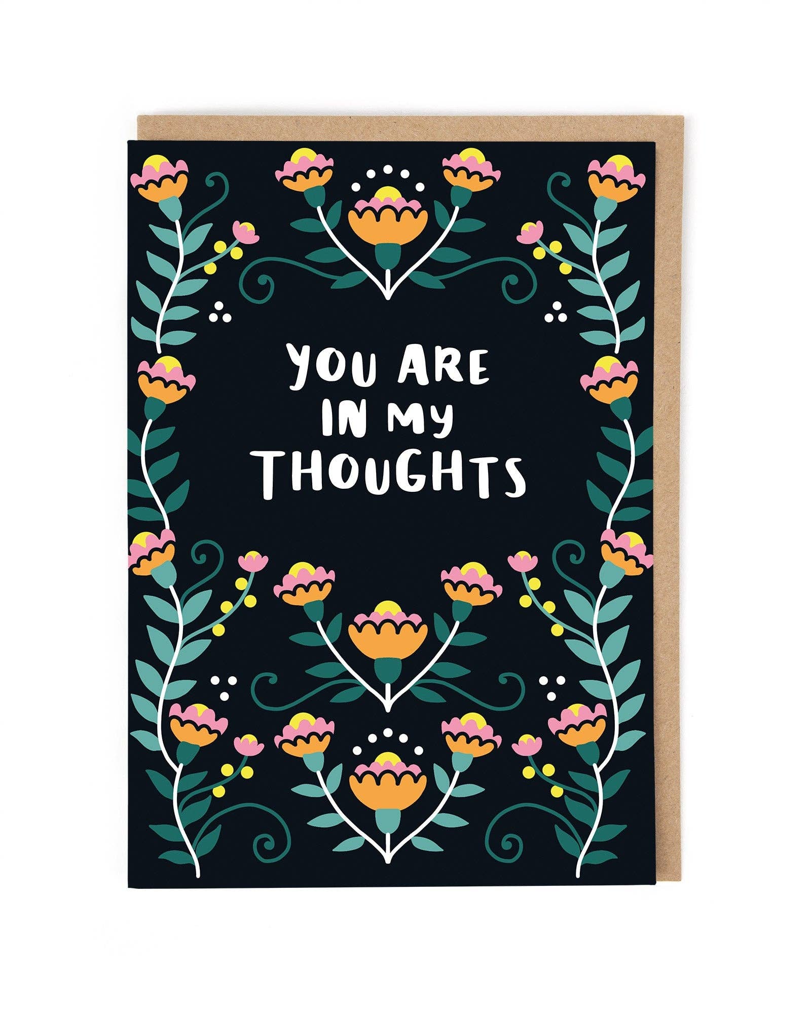 Greeting card with floral design and text 'You are in my thoughts' on a black background