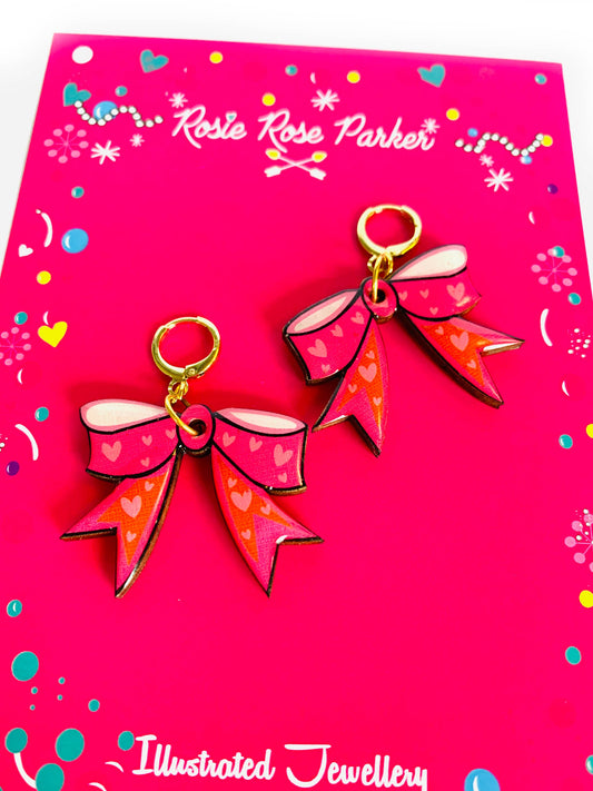 Wood and resin drop bow earrings.