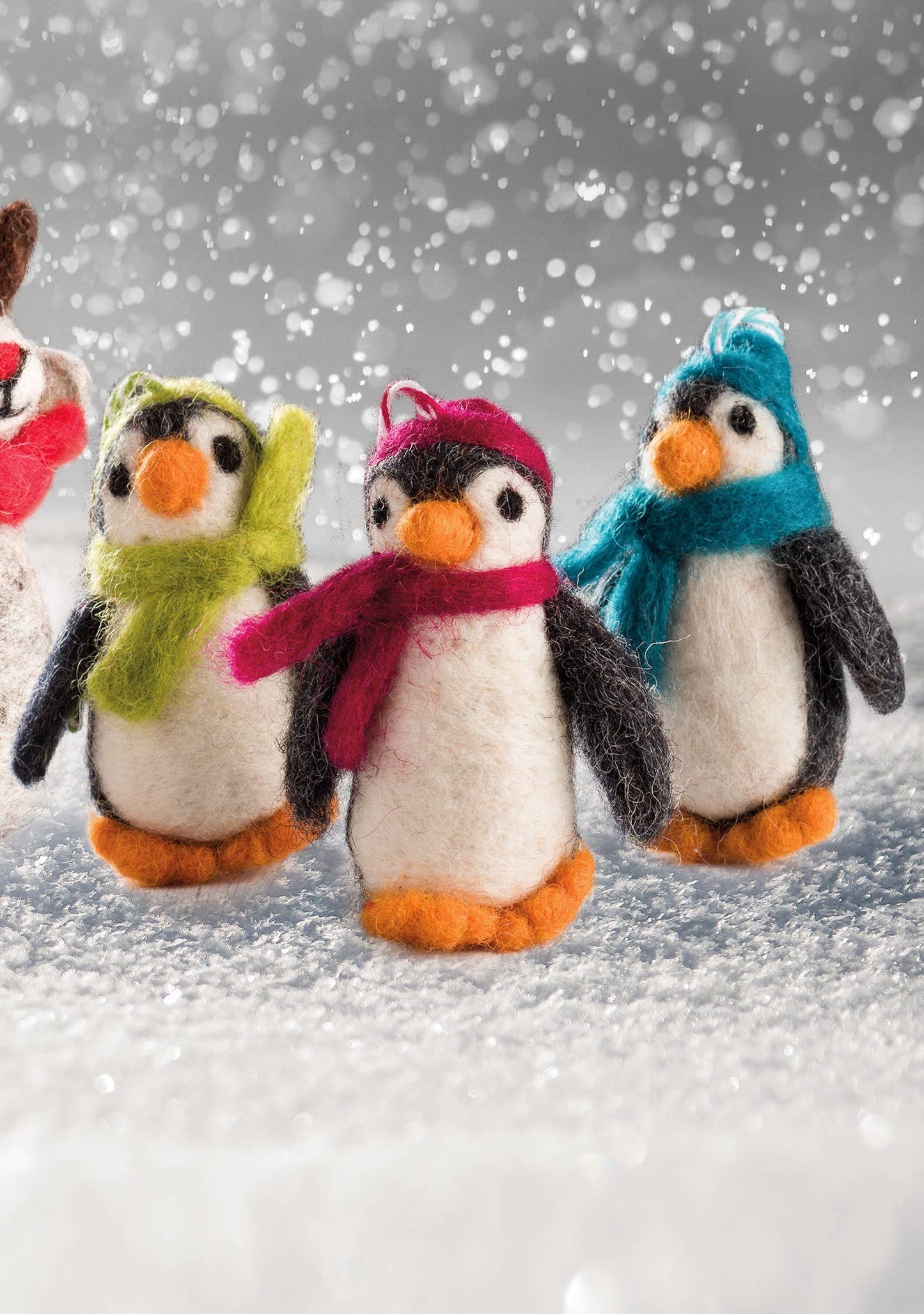 Set of 5 Felted penguins with hats and scarves.