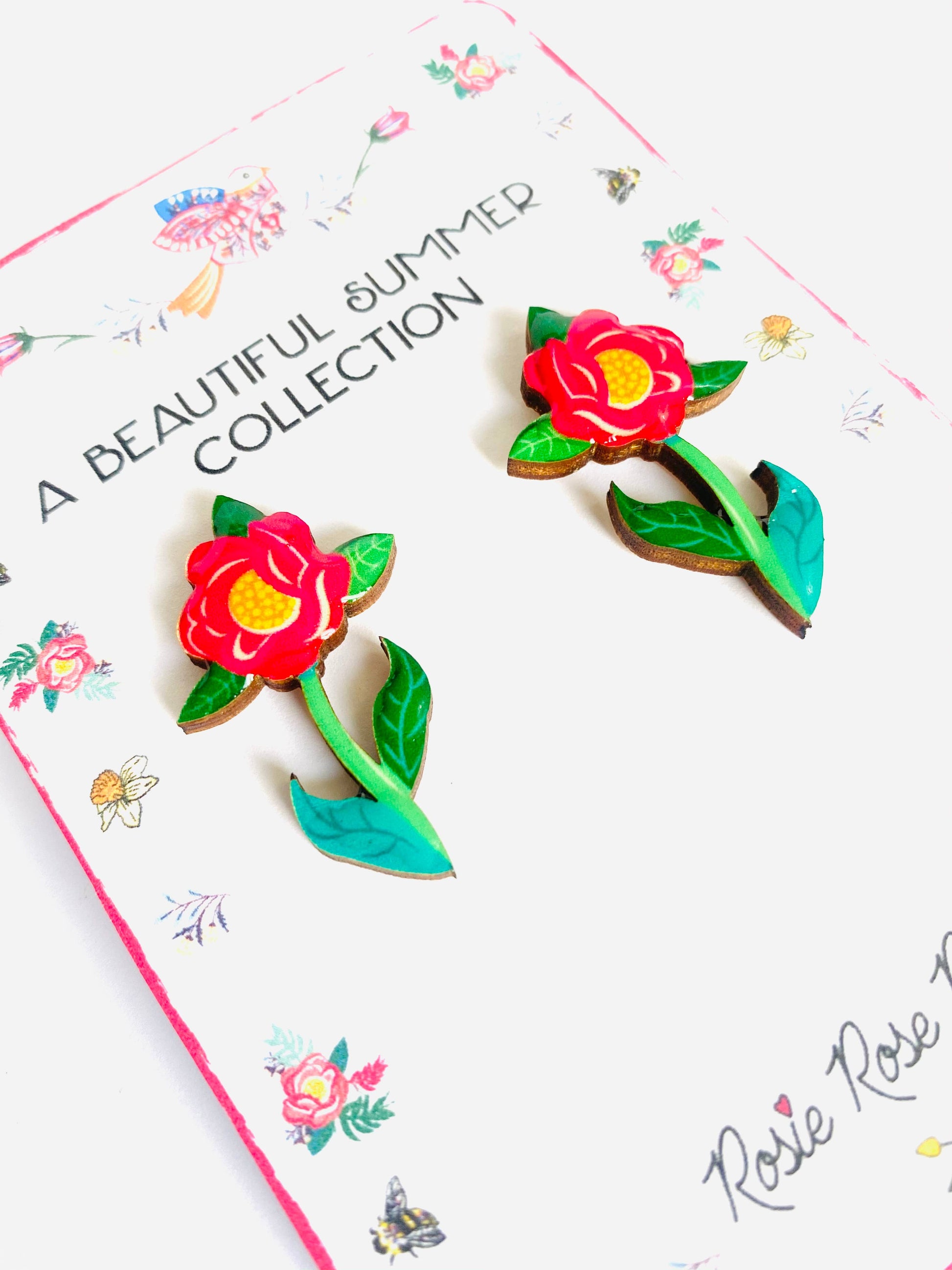 Resin and wooden flower earrings with stem.