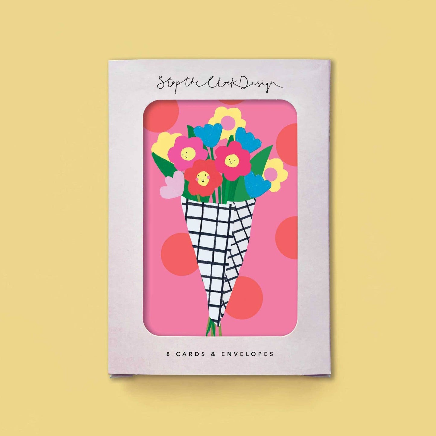 Card set packaging with floral design and 'Stop the Clock Design' branding on a yellow background