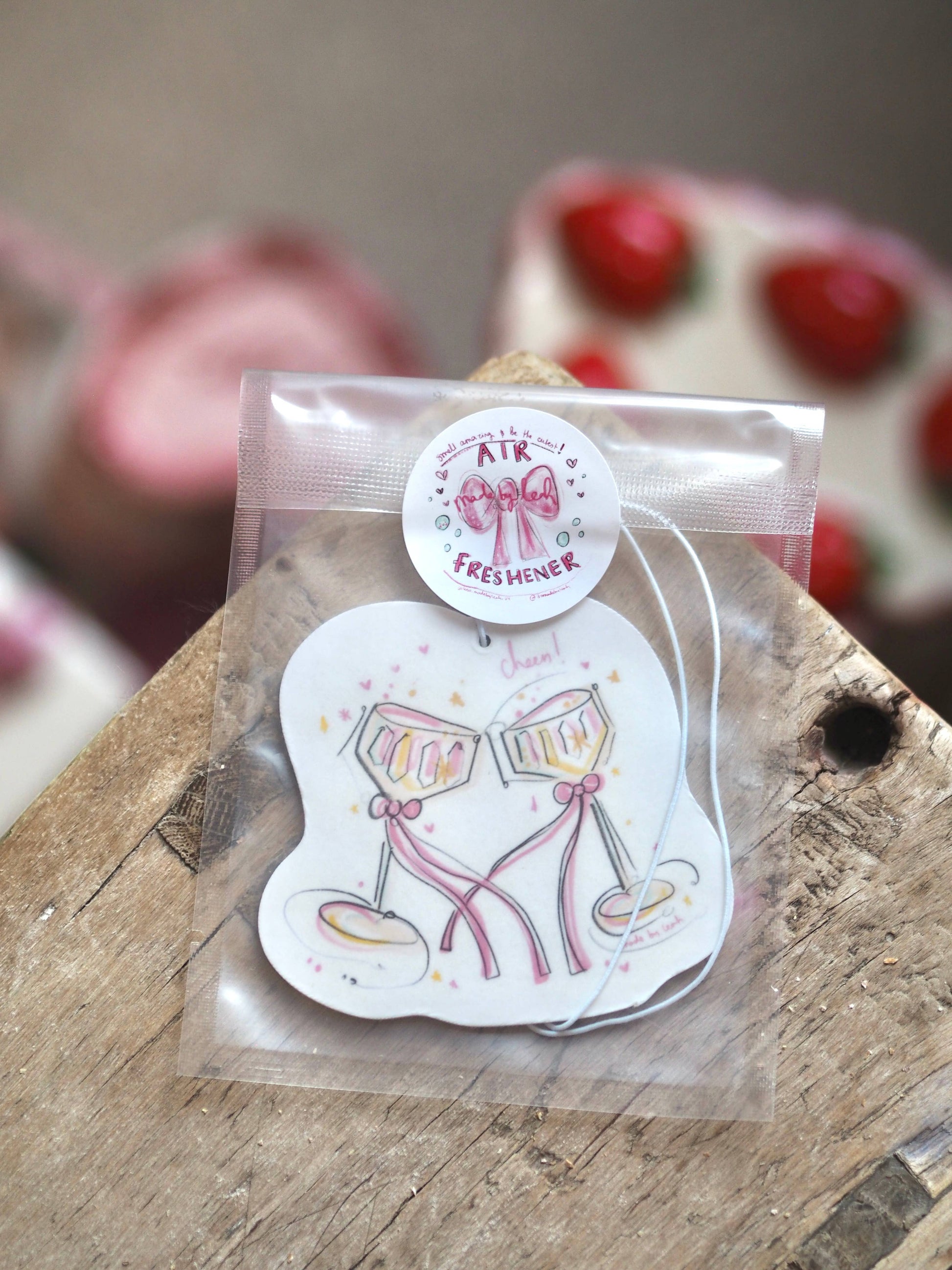 Clear plastic bag with a cartoon design on a wooden surface