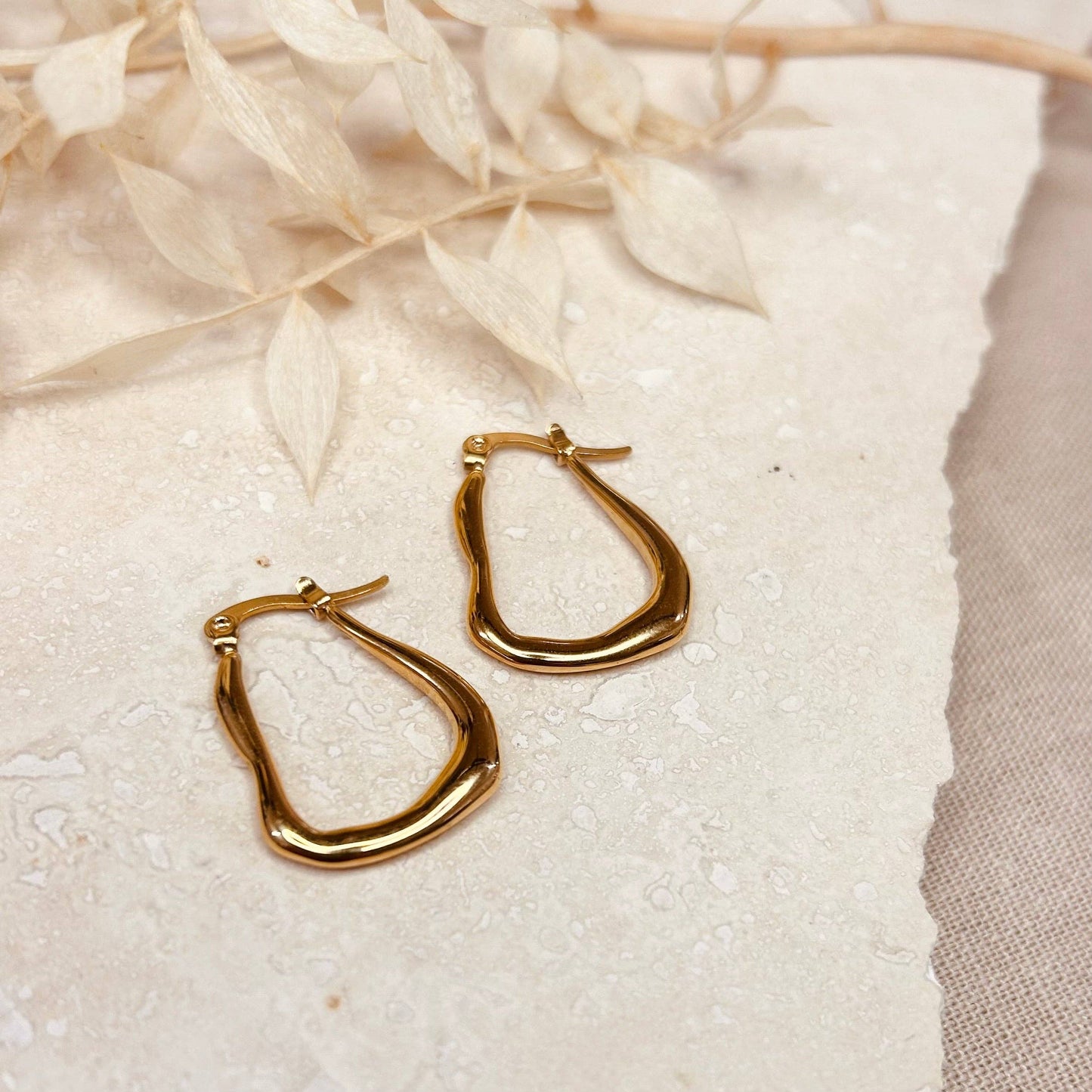 Gold plated abstract hoops