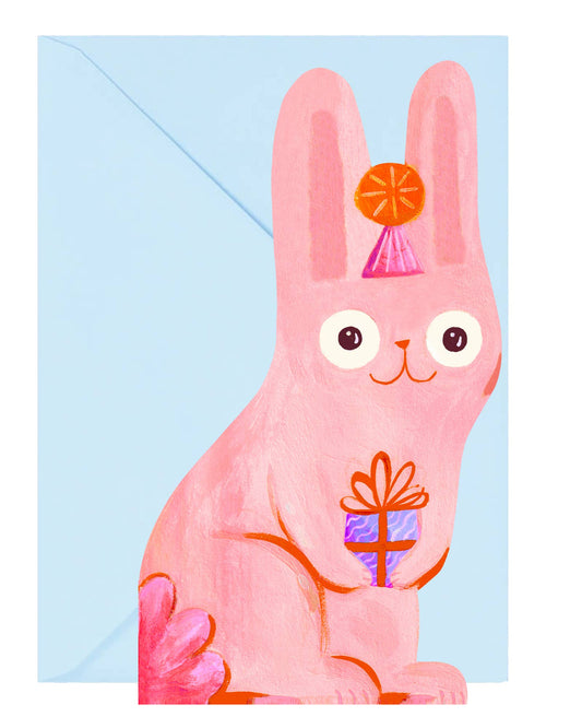 Card with a pink rabbit holding a gift on a light blue background