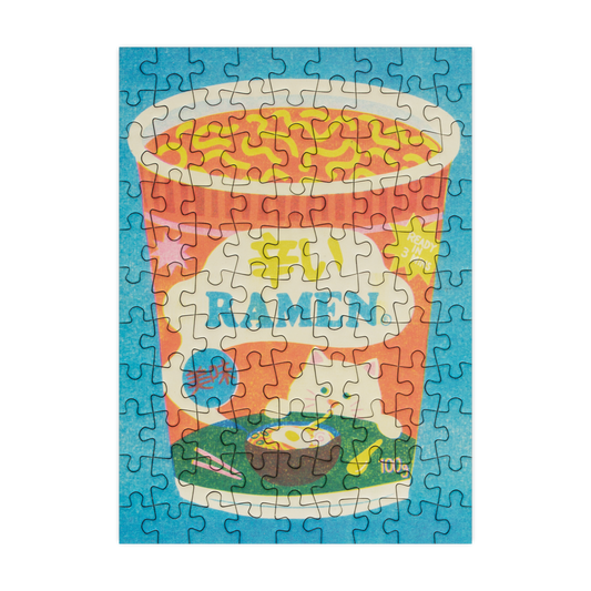 Puzzle with a cup of instant ramen design on a blue background