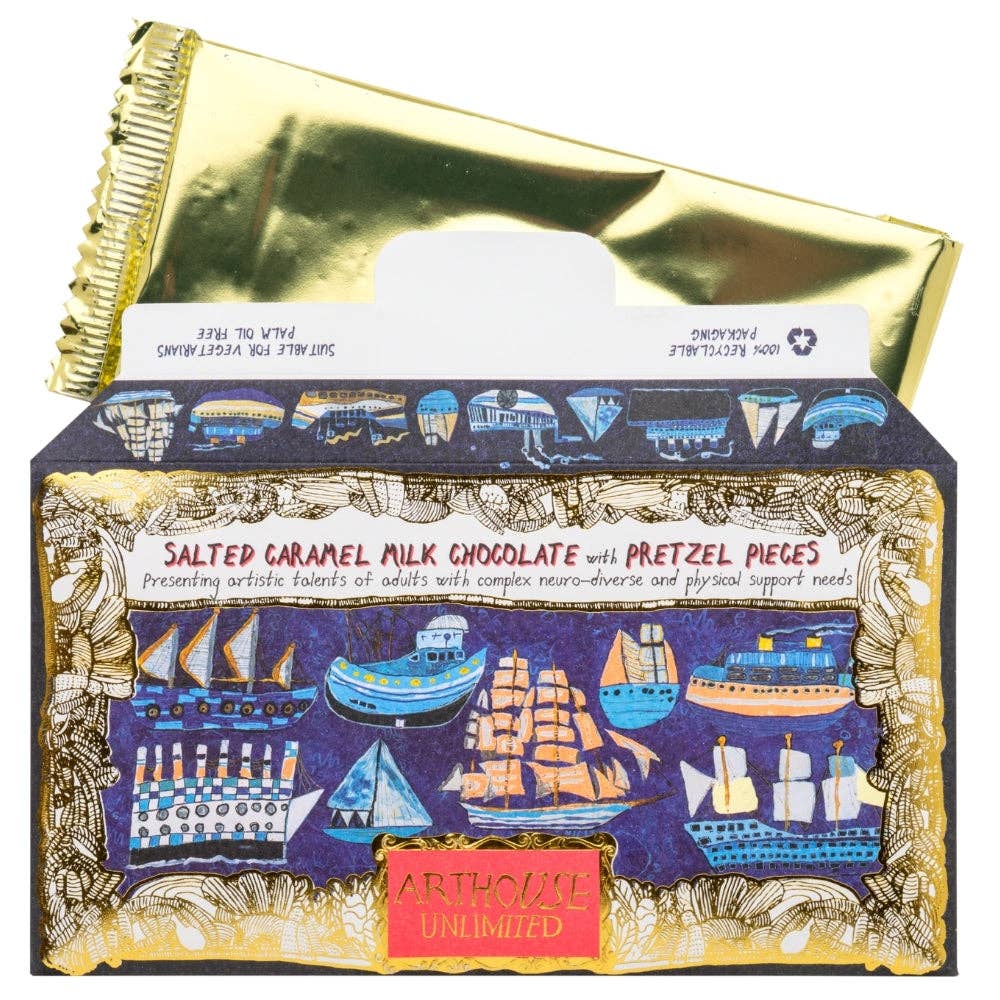 Chocolate bar packaging with gold foil and ship illustrations on a white background