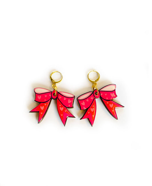 Wood and resin drop bow earrings.