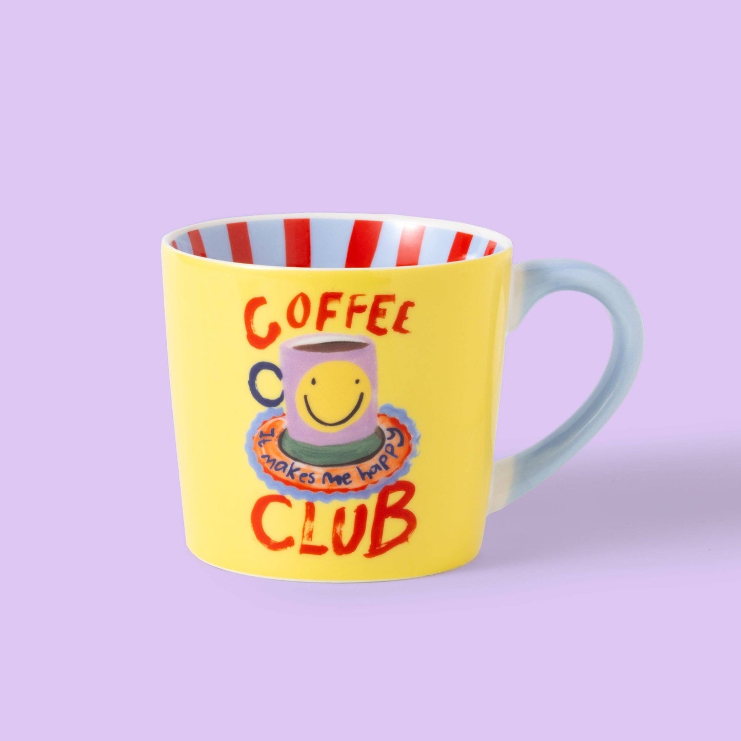 Yellow mug with 'Coffee Club' text and smiley face design on a purple background