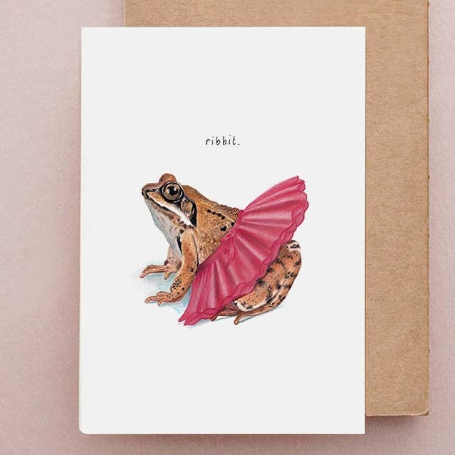 Greeting card with a frog wearing a pink tutu on a white background