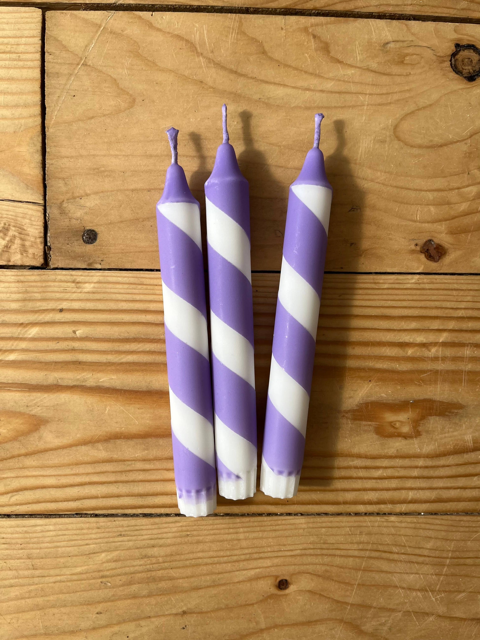 Purple & White table candles.