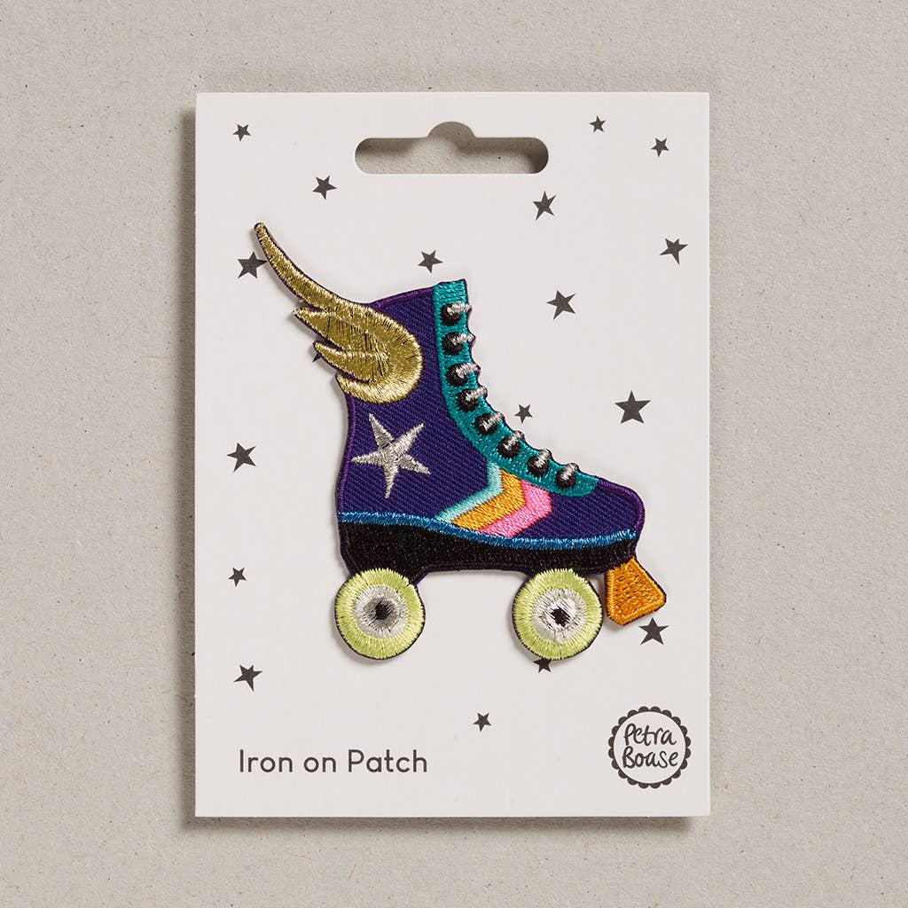 Iron on patch. Rollerskate with wing.