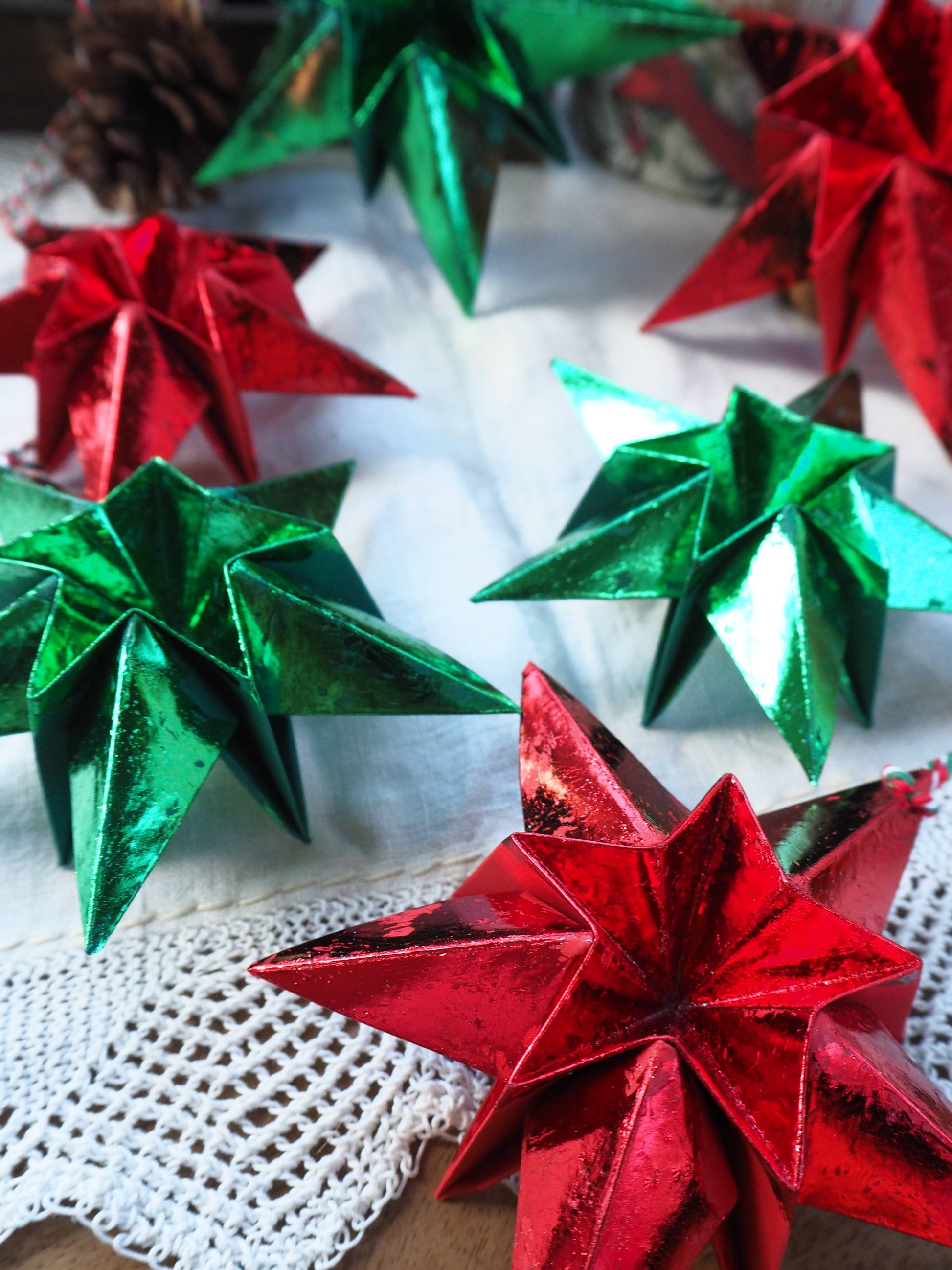 Origami Metallic Paper Star Decoration in red or green.