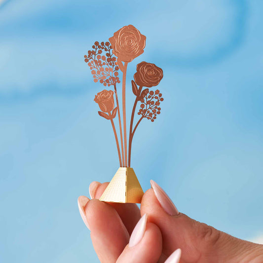 Tiny Bouquet of Roses made from copper metal.