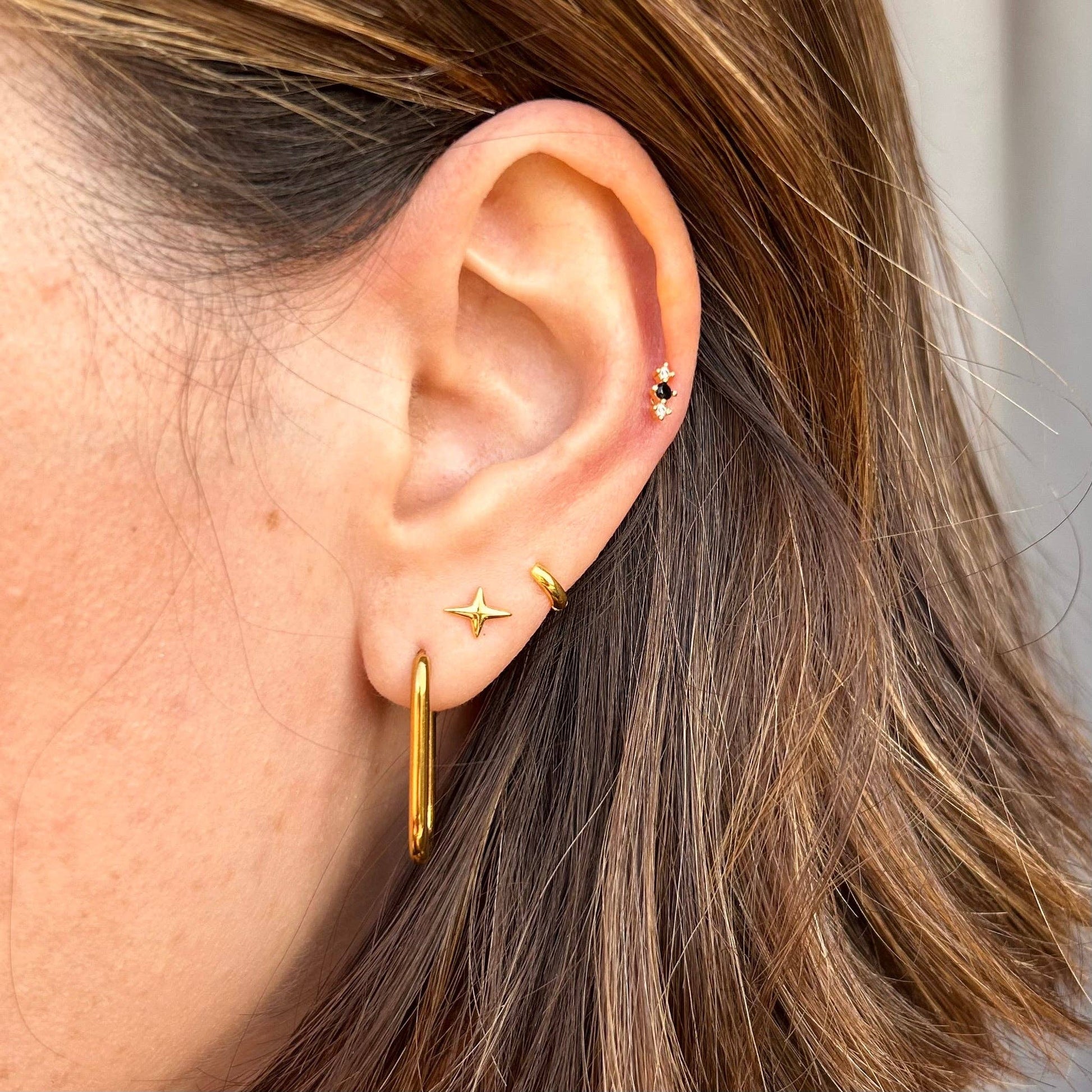 gold or silver star burst stud