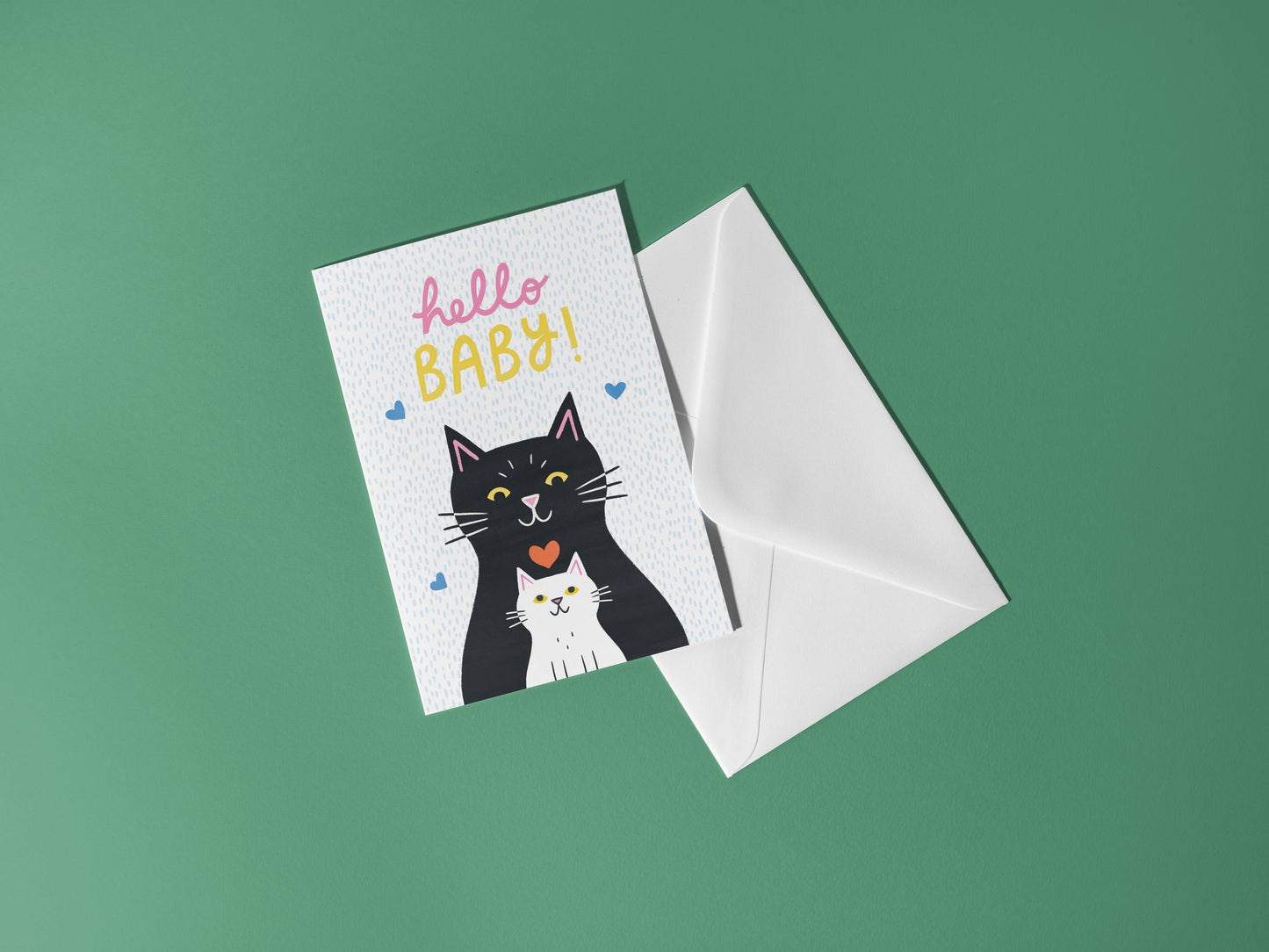 Greeting card with a cat illustration and 'hello baby!' text on a green background