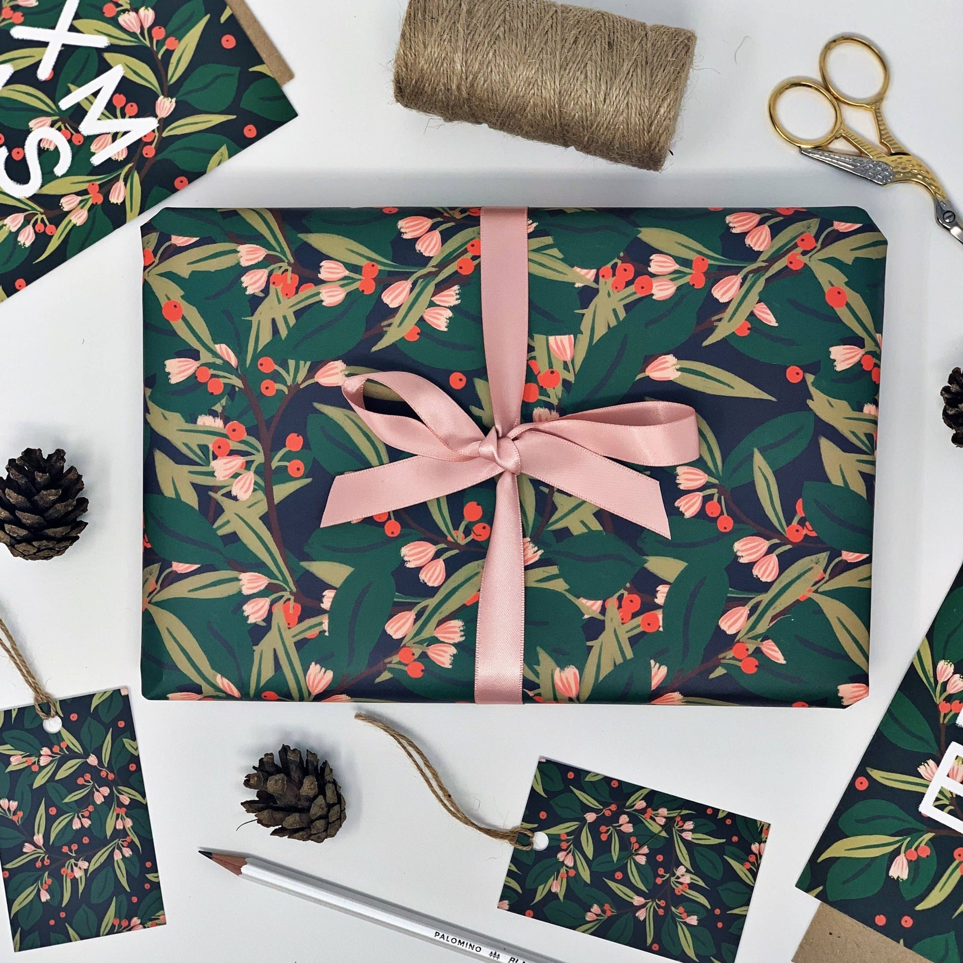 Christmas greenery deep green gift wrap. Winter flowers, suitable for winter birthdays.