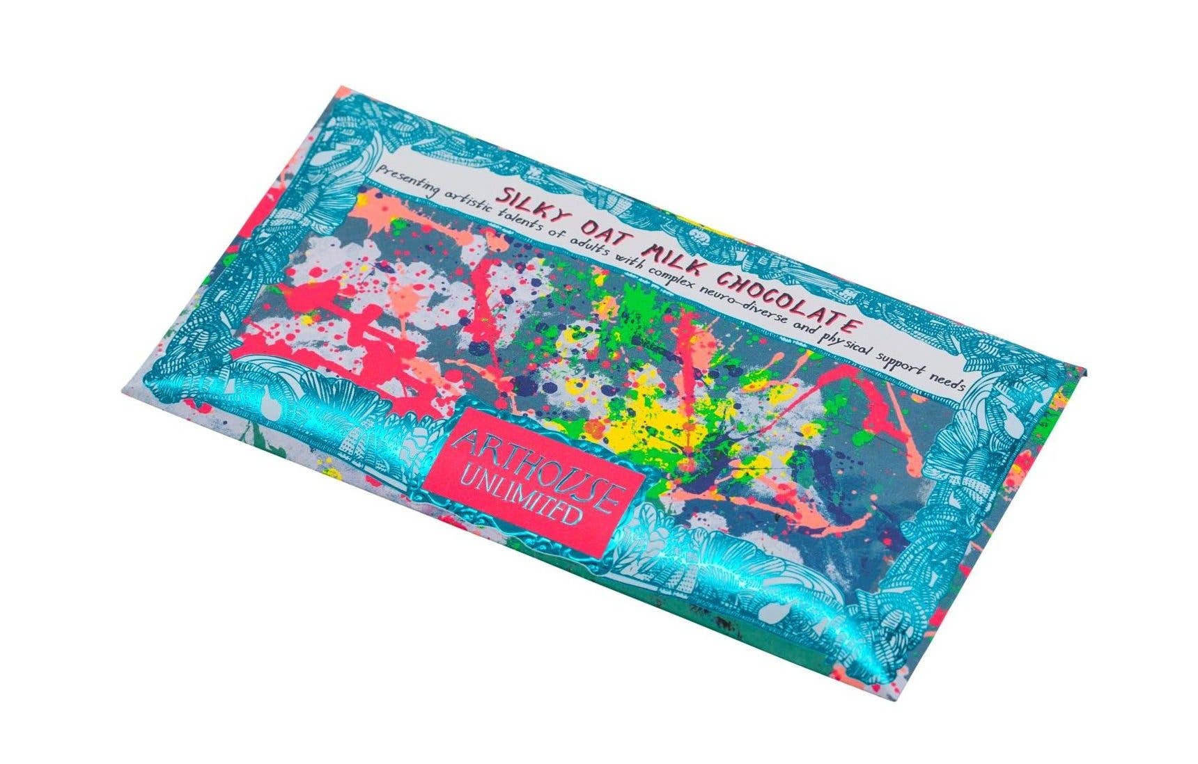 Silky Oat Milk Chocolate bar with colorful packaging on a white background