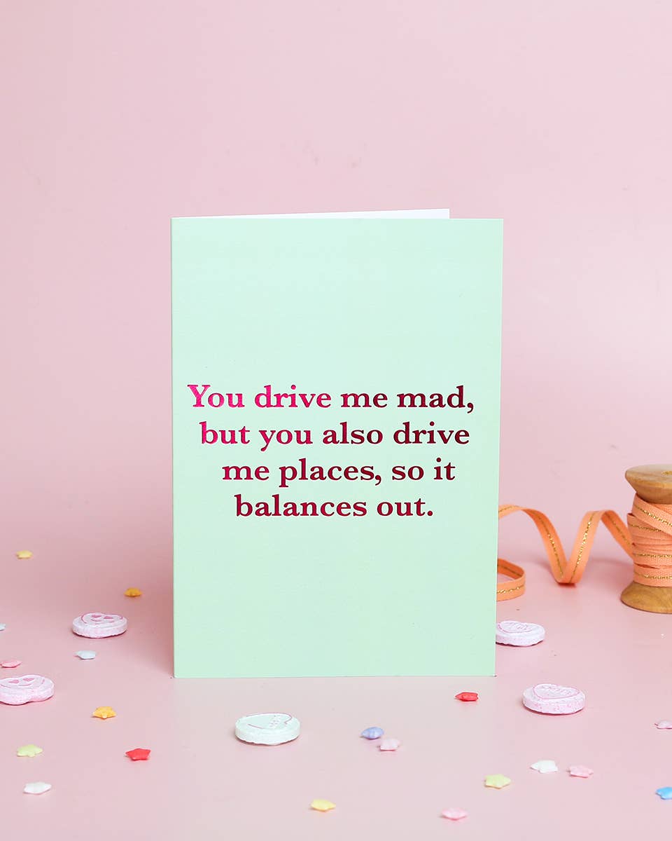 Card with humorous message on a pink background with decorative elements