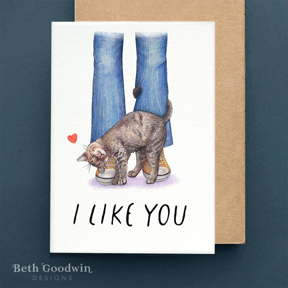 Card with a cat and text 'I LIKE YOU' on a blue background, featuring Beth Goodwin Designs.