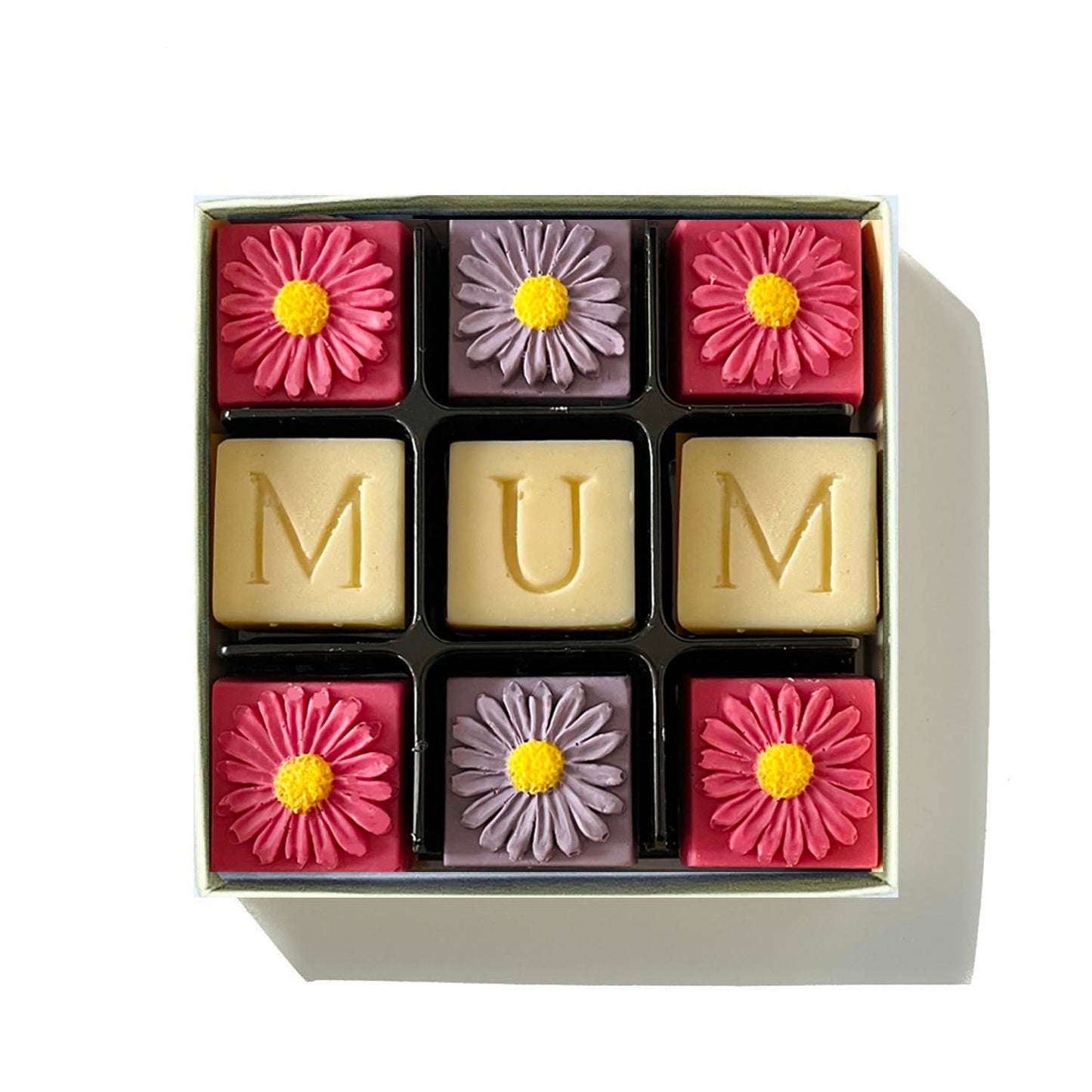 Belgium chocolate handmade in Somerset.  Mum in white chocolate and pink and lilac flowers.