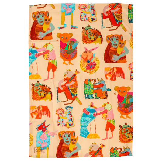 Colorful patterned fabric with cartoonish animal characters on a beige background