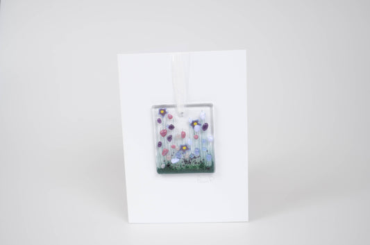 Framed artwork with colorful abstract design on a white background