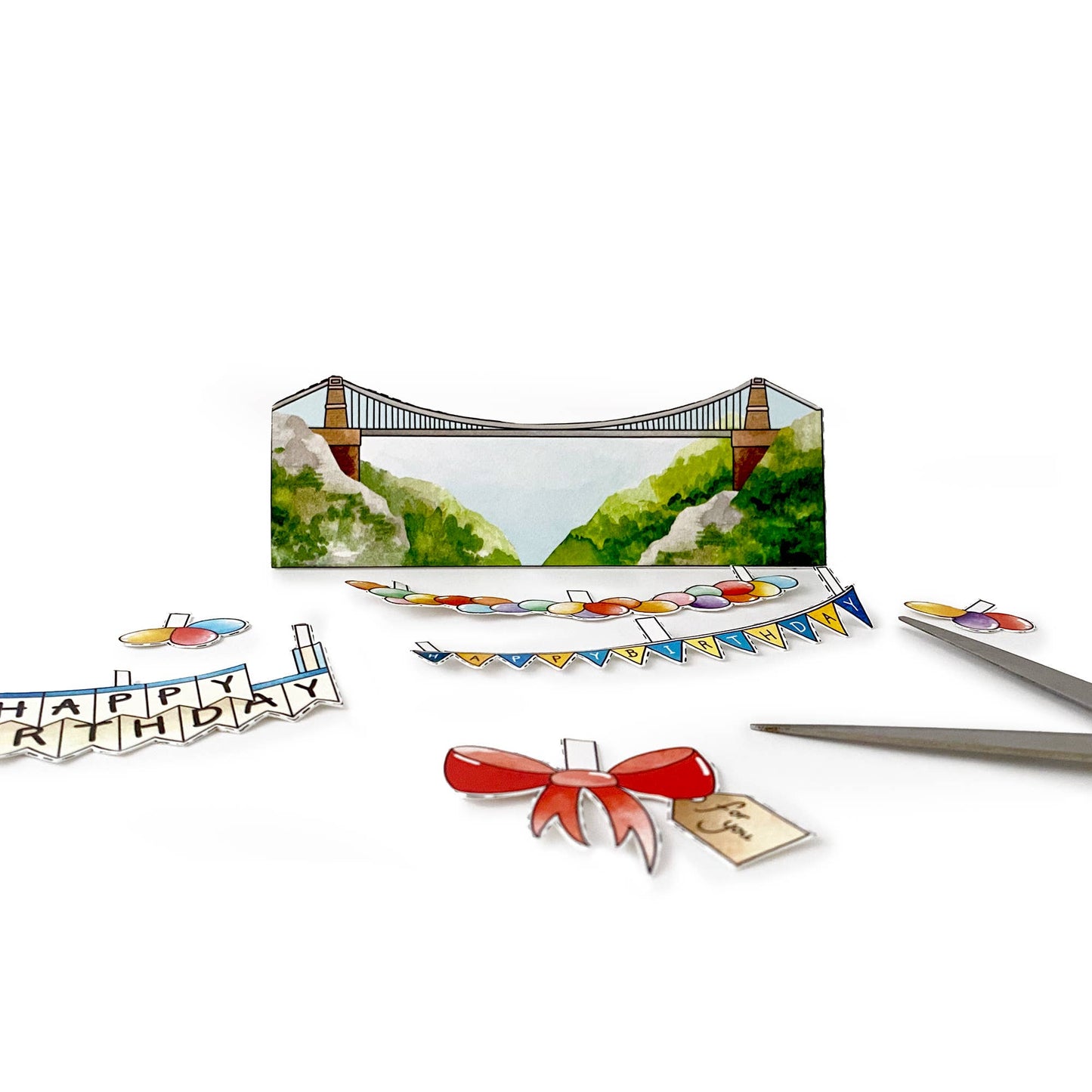 Greeting card with scenic view, 'Happy Birthday' banner, and decorative elements on a white background