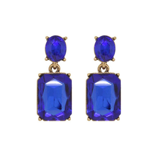 Pair of blue gemstone earrings with gold accents on a white background