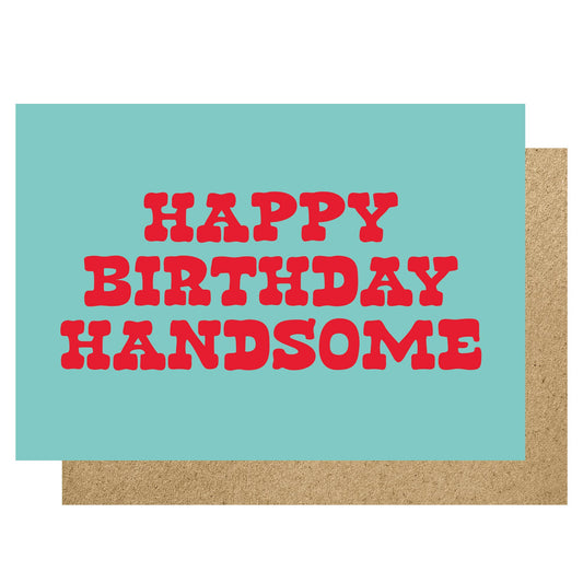Greeting card with 'Happy Birthday Handsome' text on a light blue background