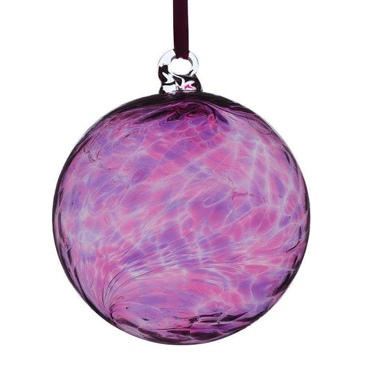 Pink & purple glass bauble on a ribbon against a white background.