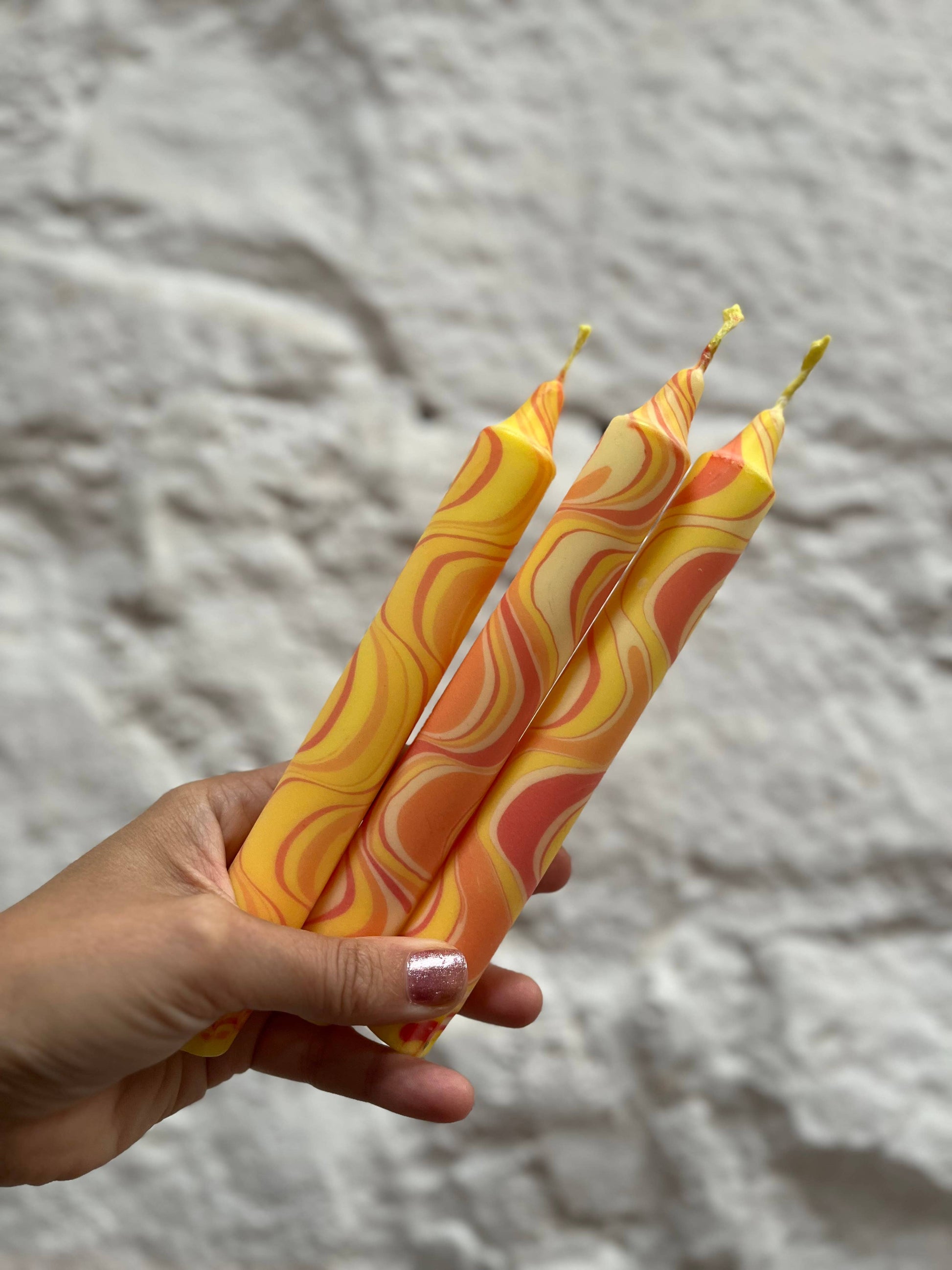 Yellow marble table candle.