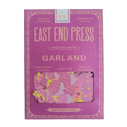 Purple packaging of East End Press Garland printed paper with floral design